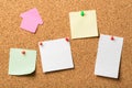 Pinned paper notes on cork board Royalty Free Stock Photo