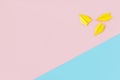 Yellow paper airplanes on a pink and blue background.