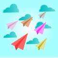 Paper planes multicolor on blue sky with clouds - vector concept Royalty Free Stock Photo
