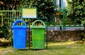 Paper and plastic recycle bin placed in the garden for cleanness. cleanness concept