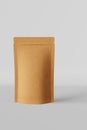 Paper pouch bag mockup white background isolated 3D render. Merchandise packaging design. Blank brown kraft pack coffee Royalty Free Stock Photo