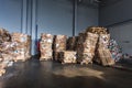 Paper pressed bales at the modern waste hazardous processing plant. Separate garbage collection. Recycling and storage of waste Royalty Free Stock Photo