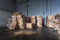 Paper pressed bales at the modern waste hazardous processing plant. Separate garbage collection. Recycling and storage of waste Royalty Free Stock Photo