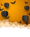 Paper pumpkins and bats on orange background Royalty Free Stock Photo