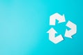 Paper Recycle logo cutout on blue background. Environmental Protection, Zero waste, Reusable, Say No Plastic, World Environment Royalty Free Stock Photo