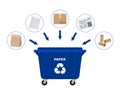 Blue industrial garbage can and paper products suitable for recycling.