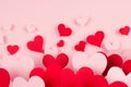 Paper red and pink hearts with blur perspective on soft pink color background. Valentine day concept for design. Royalty Free Stock Photo