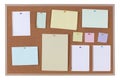 Paper reminder notices on a cork notice board on white with clipping path Royalty Free Stock Photo