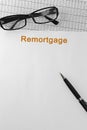 Paper with Remortgage on a table Royalty Free Stock Photo