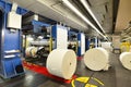 Paper rolls and offset printing machines in a large print shop f