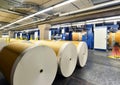 Paper rolls and offset printing machines in a large print shop f Royalty Free Stock Photo