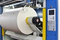 Paper rolls in a printing machine of a large print shop Royalty Free Stock Photo