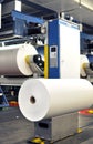 Paper rolls in a printing machine of a large print shop Royalty Free Stock Photo