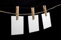 Paper on rope with clothes pins Royalty Free Stock Photo