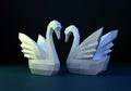 Paper sculpture of a polygonal Swans, folded paper animal, papercraft, two swans love concept