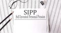 Paper with Self-Invested Personal Pension SIPP on a table Royalty Free Stock Photo