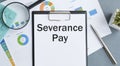 Paper with Severance Pay on a table. Business