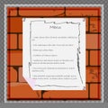 A paper sheet for menu or other information on the background of a brick wall Royalty Free Stock Photo