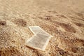 Paper sheets on golden sands