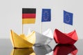 Paper ship with german and european flag Royalty Free Stock Photo