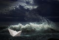 Paper ship in storm concept Royalty Free Stock Photo