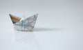 Paper ships from the map Royalty Free Stock Photo