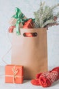 Paper shopping bag full of gift boxes Christmas ornamented