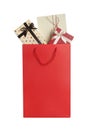 Paper shopping bag full of gift boxes isolated Royalty Free Stock Photo