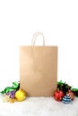 Paper shopping bags christmas decoration with balls and stars on