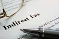 Paper with sign Indirect tax and glases Royalty Free Stock Photo