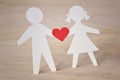 Paper silhouette of children with a heart - childhood love conc