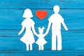 Paper silhouette of family with red heart Royalty Free Stock Photo