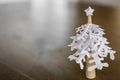 Paper snowflakes christmas tree on wood table Royalty Free Stock Photo