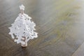 Paper snowflakes christmas tree on wood table Royalty Free Stock Photo