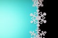 Paper snowflakes on turquoise background, top view Royalty Free Stock Photo