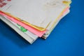 Paper stack on blue desk Royalty Free Stock Photo