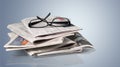 Stack of newspapers and eyeglasses on grey Royalty Free Stock Photo