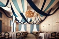 paper streamer hanging from ceiling in elegant hotel banquet room