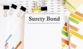 Paper with Surety Bond on a table. Business concept Royalty Free Stock Photo
