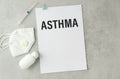 text ASTHMA on a table with stethoscope. Medicina Royalty Free Stock Photo