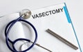 Paper with text VASECTOMY on a table with stethoscope Royalty Free Stock Photo