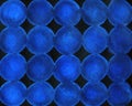 Simple abstract background with bubbles. Blue watercolor dots circles isolated on black background.