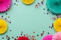 Paper texture flowers on green background. Birthday, holiday or party background. Flat lay style