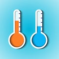 Paper thermometer averages readings on a blue background. Royalty Free Stock Photo