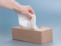 Paper tissue box on blue background Royalty Free Stock Photo