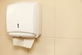 Paper towel dispenser in the bathroom Royalty Free Stock Photo