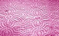 Paper towel surface with blur effect in pink color