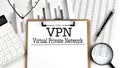 Paper with VPN - Virtual Private Network on a chart with calculator,pen and magnifier