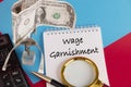 Paper with Wage Garnishment on a table Royalty Free Stock Photo