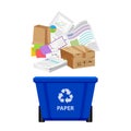 Paper waste and blue recycling plastic bin isolated on white background, plastic bin and paper recycling garbage, waste paper Royalty Free Stock Photo